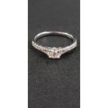 9 CARAT WHITE GOLD & DIAMOND RING WITH CIRCA HALF CARAT OF DIAMONDS