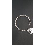 9 CARAT WHITE GOLD & CZ BRACELET