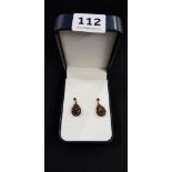 PAIR OF VICTORIAN 15 CARAT GOLD GARNET SET EARRINGS