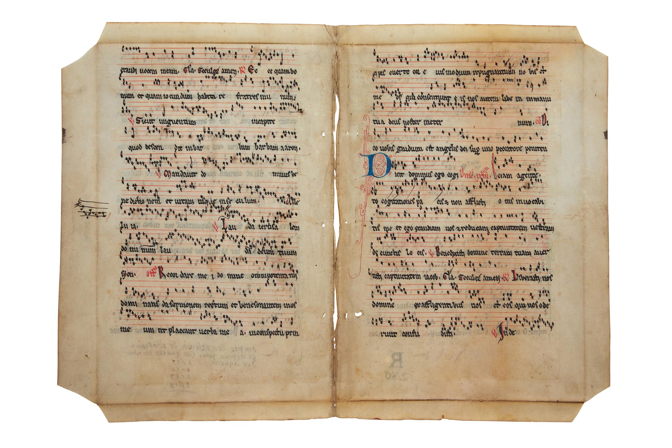 Bifolium from an early choirbook, in Latin, decorated manuscript on parchment