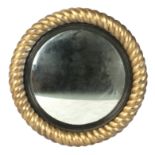 An early 19th century giltwood and gesso convex Mirror