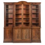 An early 19th century and later mahogany breakfront bookcase cabinet