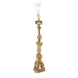 A 19th century and later giltwood and gesso torchere