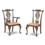 A set of ten 18th century style mahogany dining chairs, in the manner of Chippendale, 20th centur...