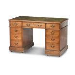 An early 20th century mahogany pedestal desk