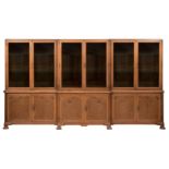 A mid 20th century oak and walnut breakfront bookcaseIn the Chinese Chippendale style, probably b...