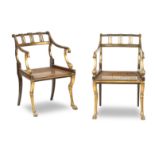 A pair of 19th century parcel gilt and simulated rosewood open armchairs in the manner of Thomas ...