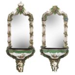 A pair of Dresden porcelain mirror-backed shelves Late 19th Century