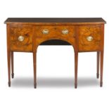 A George III mahogany and boxwood lined bowfront sideboard