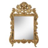 A late 19th/early 20th century French carved giltwood wall mirror