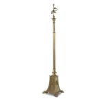 An early 20th century adjustable brass standard lamp