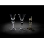 Two moulded stem wine glasses and a fragmentary 'God Save King George' wine glass Circa 1714-25