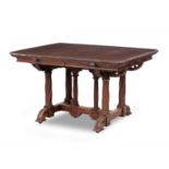 A mid 19th century walnut Reformed Gothic dining table In the style of AWN Pugin