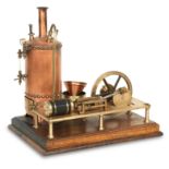 A Bassett Lowke vertical stationary reciprocating steam engine model