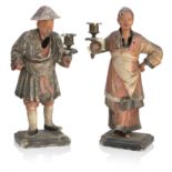 A pair of early 19th century plaster nodding head figure candelabra Inscribed to the rear 'Greens...