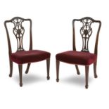 A set of eight late 19th/early 20th century mahogany dining chairs, in the 18th century manner