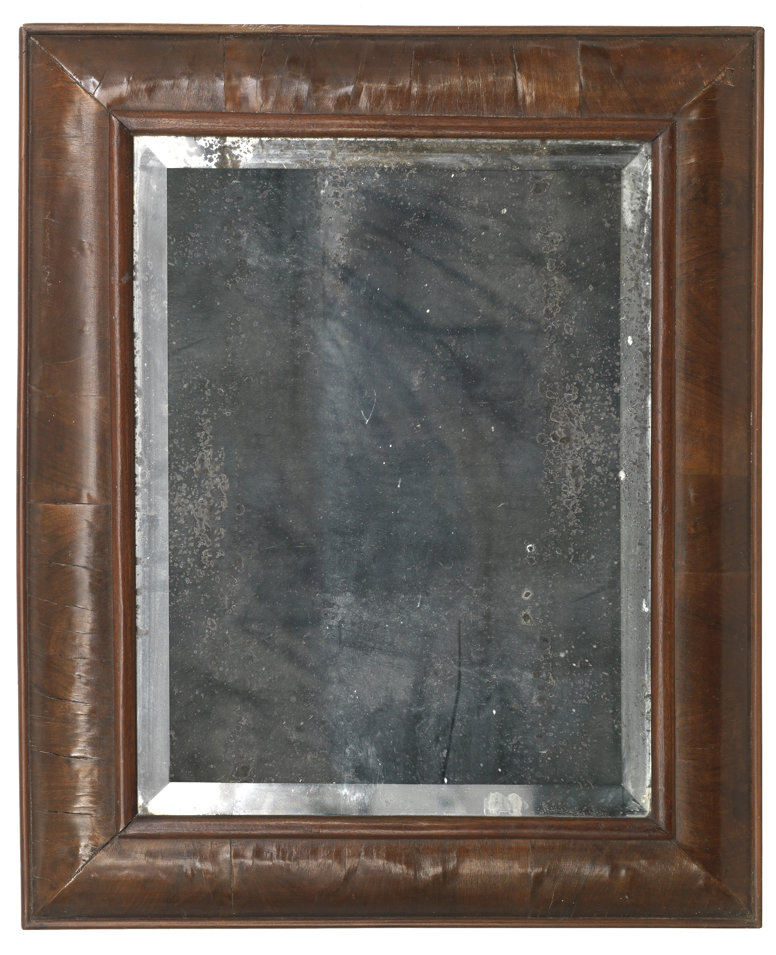 An early 18th century walnut cushion framed wall mirror