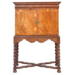 An 18th century and later walnut cabinet-on-stand