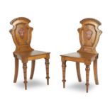 A pair of 19th century oak hall chairs (2)