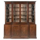 A George III mahogany breakfront bookcase