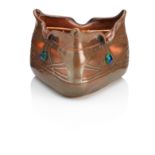 A triangular Art Nouveau copper mounted glass bowl