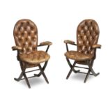 A pair of French 1960's Poly-X Polyconfort mahogany and leather folding chairs (2)