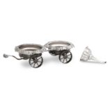 An early Victorian silver wine funnel and an Old Sheffield plated decanter wagon by Joseph Angell...