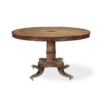 A Regency rosewood and brass inlaid breakfast table in the manner of George Oakley