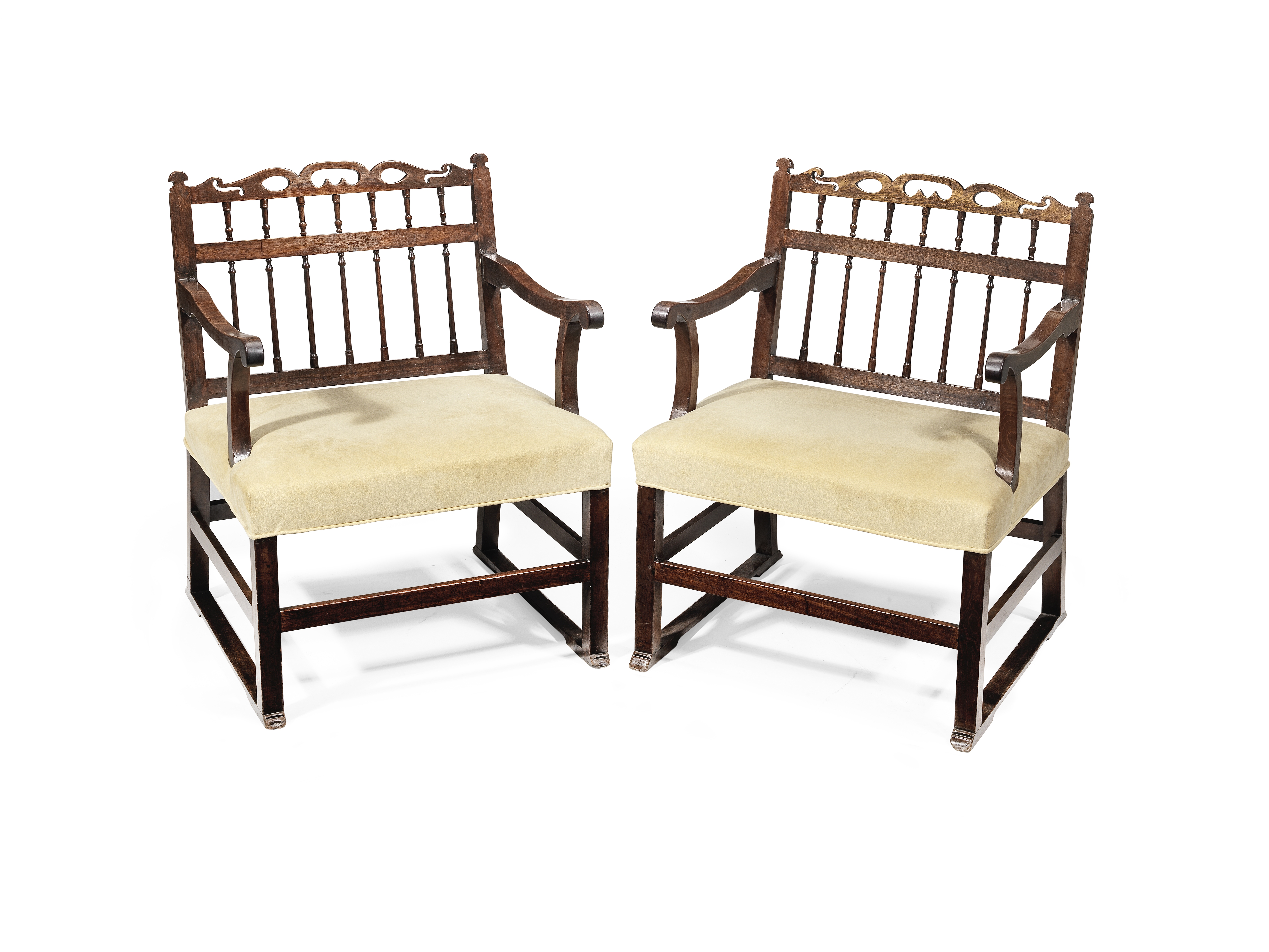 A pair of George III mahogany armchairsprobably of North Country origin, late 18th/early 19th cen...