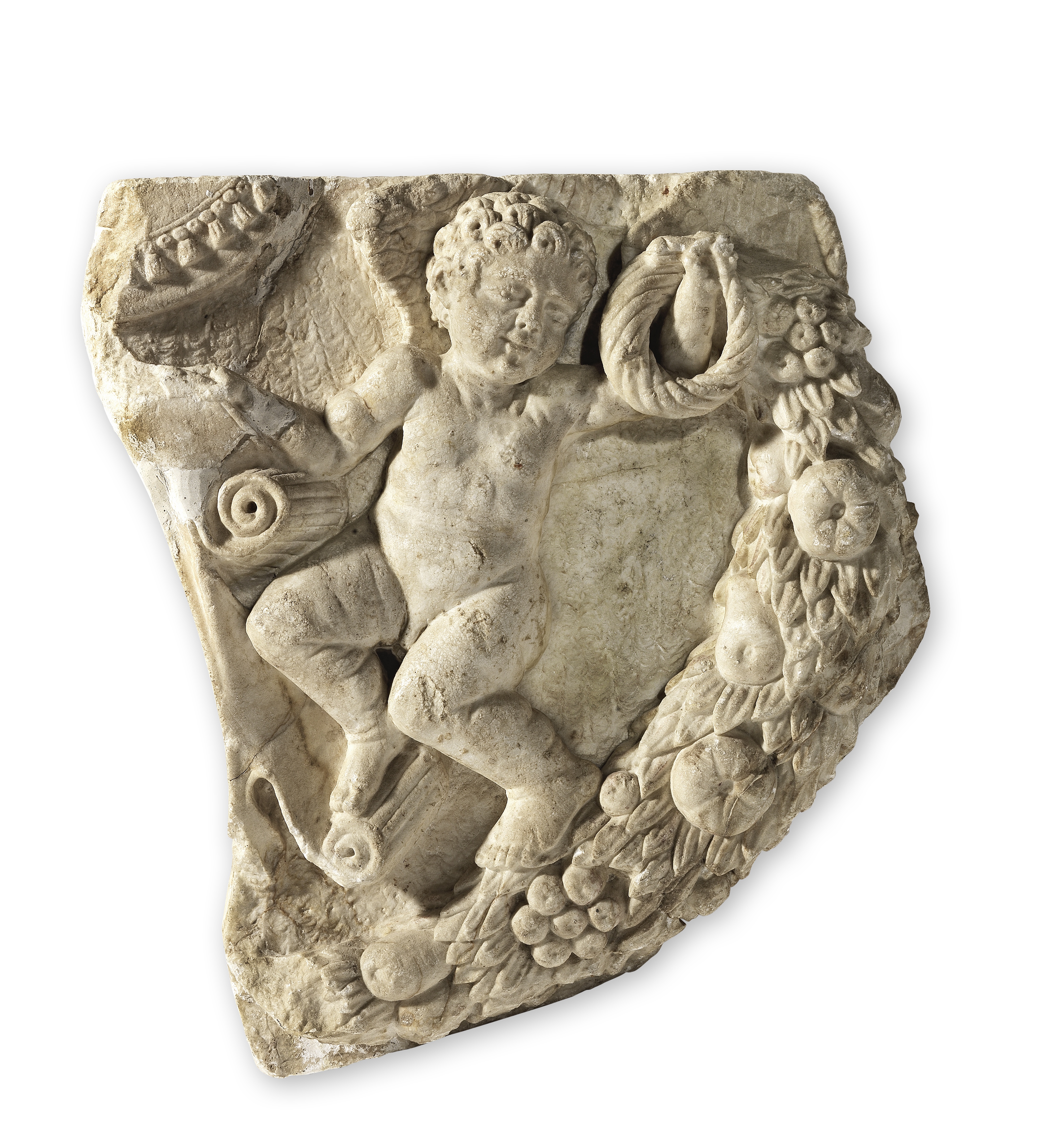 A carved white marble figural fragment