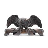 A carved and painted oak 'Eagle Insurance' cresting probably early 19th century