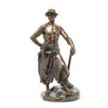 Marcel Debut (French, 1865-1933): A patinated bronze figure of a miner