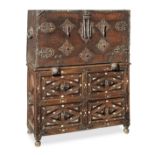 A Spanish 17th century iron mounted walnut, decorated bone-inlaid and parcel gilt 'bargueno de ta...