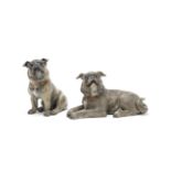 A pair of amusing Austrian painted terracotta models of pugs probably late 19th or early 20th cen...