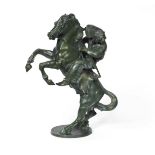 A large green patinated bronze figure of a Native American cast from a model by Bruno Zach signed...