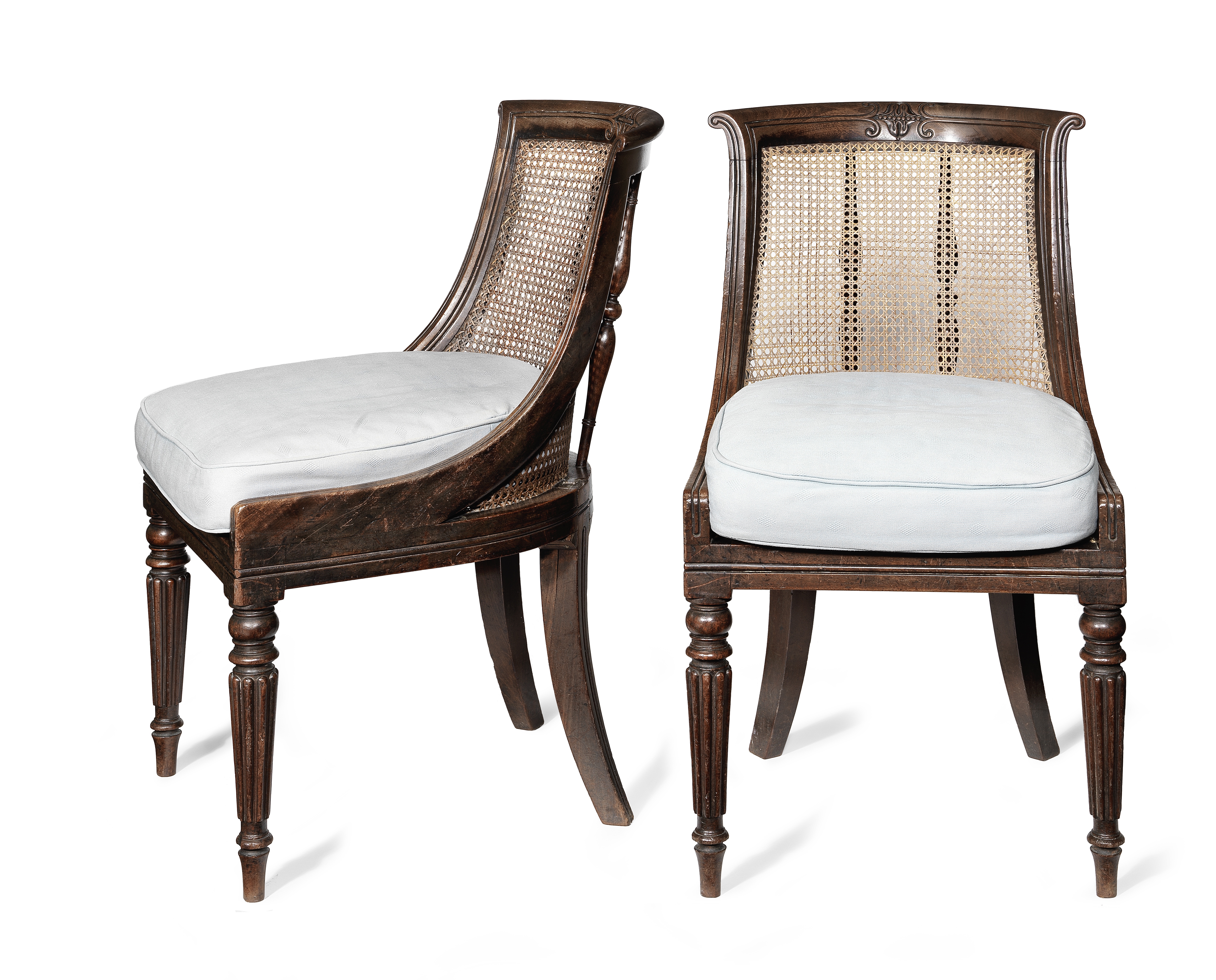 A pair of George IV mahogany caned side chairs (2)