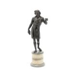 A late 19th/early 20th century patinated bronze figure of a Bacchic youth