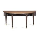 A Regency mahogany wine, hunt or social table in the manner of Gillows