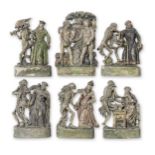 A collection of six 19th century German painted terracotta figural plaques probably Zizenhausner,...