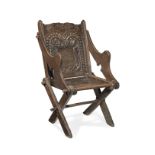 An extremely rare and documented Elizabeth I oak so-called Glastonbury chair, West Country, circa...