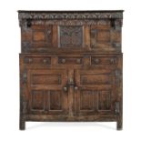 A George I joined oak court cupboard, Welsh, dated 1724