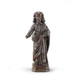 A 17th century carved lime-wood figure of Christ