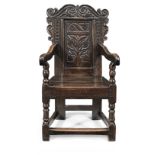 A good Charles II joined oak panel-back open armchair, Yorkshire, circa 1670