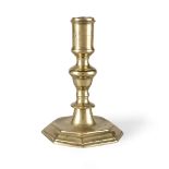 A William & Mary brass candlestick, circa 1690