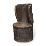 Am impressive 19th century dug-out chair, with cupboard base Stained beech and pine