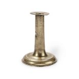 A small mid-17th century brass alloy trumpet-based candlestick, England, circa 1650-80