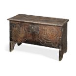 A small Charles I boarded oak chest, circa 1640