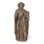 An early 16th century carved oak sculpture of a male saint, Flemish, circa 1500-30