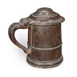 A rare George I turned lignum vitae dome-lidded tankard, circa 1720