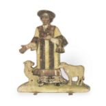 A 19th century free-standing wooden and needlework figure of a priest, Italian